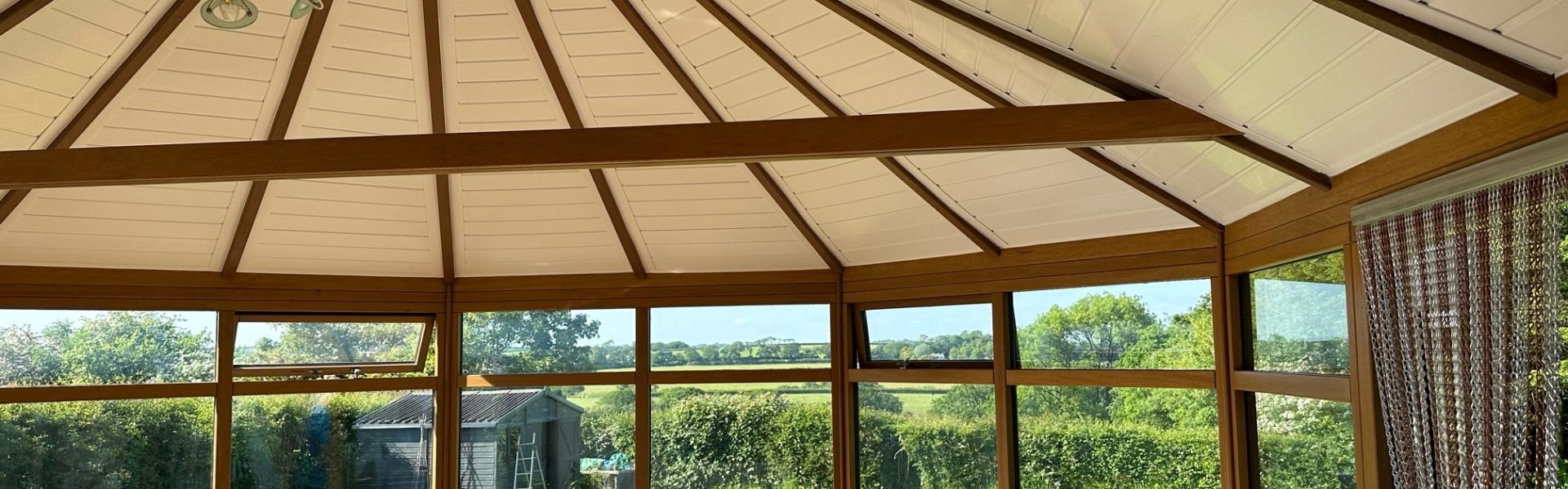 large wooden conservatory with internal insulation
